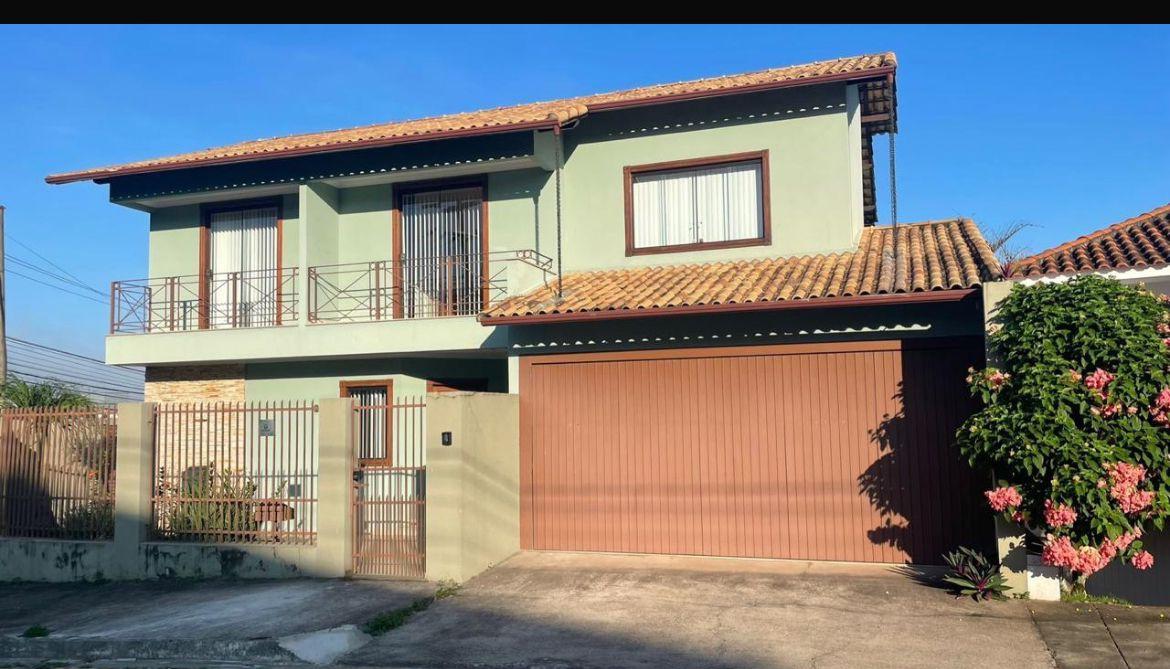 Casa à venda com 4 quartos, 248m² - Foto 1